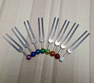 Solve chakra tuning forks jigsaw puzzle online with 132 pieces