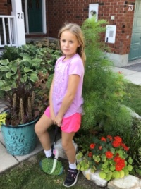 Emma with the cosmos that never bloomed