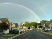 Double Rainbow in Sun Shower