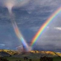 Tornado sucks up a rainbow...is this real