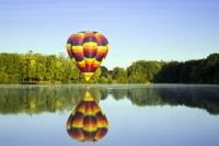Balloon reflected on lake