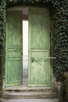 Green Door in the Garden Wall of Le Petit Trianon, Versailles, France.