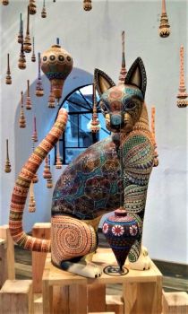 Carved Cat with Suspended Molinillos