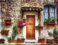 Wooden Door of Stone House and Flower Boxes by Paul Montecalvo
