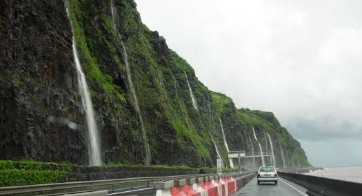 Waterfalls on Route du Littoral during Tropical storm (Reunion Island )