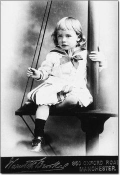 Young Boy In A Sailor Dress