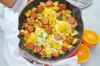 Cheesy Potato, Egg and Sausage Skillet with oranges