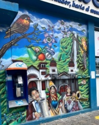 Tababela Ecuador mural with phone