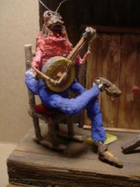 ' OL "GRAND-HOPPER"...ENJOYS PLAYING HIS BANJO, EVENINGS  AFTER  SUPPER."