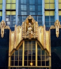 Above the Entrance to a Building in Manhatten