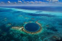 The Great Blue Hole is an underwater cenote off the coast of Belize. It is almost circular with a diameter of 300m and 120m deep