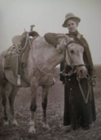 Cowgirl with Her Horse