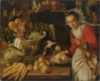 An elaborate kitchen still life with a maid holding a skewer with a piece of meat, with grapes, artichokes and bread in a copper