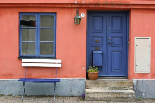 Blue door and window in Ystad, Sweden, by Manuela Hoffmann
