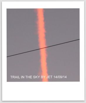 This one's for you JIM...Trail in the sky made by evening Jet flying over