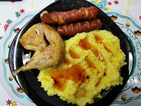 Mashed potatoes with pork sausage and a chicken leg - Hunedoara, Romania