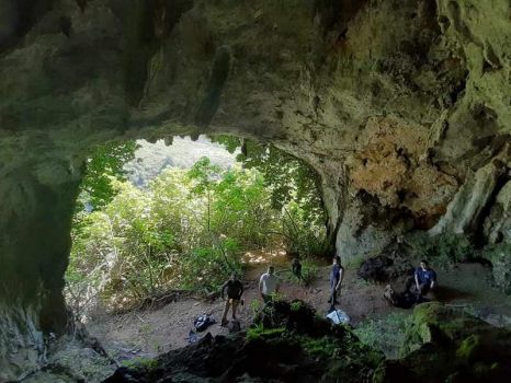 Oviedo, Spain cave with archeology team