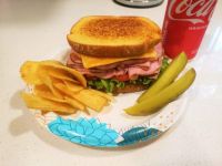 Black forest ham on toasted potato bread with leaf lettuce, tomato, Colby jack, Duke's mayo, and habanero honey mustard. Side of original ruffle chips and dill pickle spears