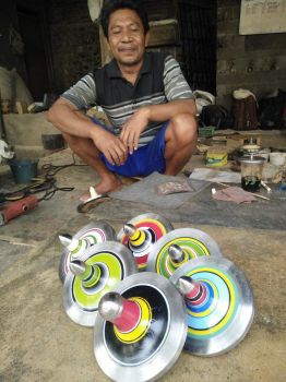 Indonesian Gasing (spintops) and thier maker Yusuf.