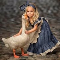 Little Girl with Her Pet Goose