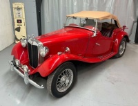 1952 MG TD red and tan