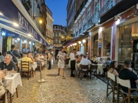 Lisbon cafe scene at night
