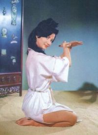 Zena Marshall as Miss Taro