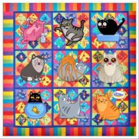 Which one are you? Cats on a quilt.