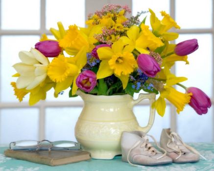 flowers and baby shoes
