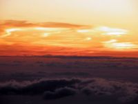 Sunset above the clouds