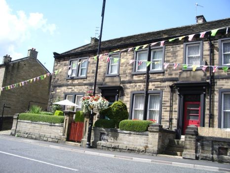 Flags out in Holmfirth, Yorkshire, England