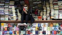 woman-reading-at-bookstore-e1475052501132