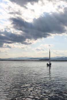 Lone sailboat, lake Champlain