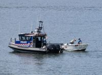 191_6683  Police checking fishing licences etc