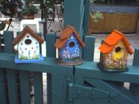 Birdhouses on Fence 