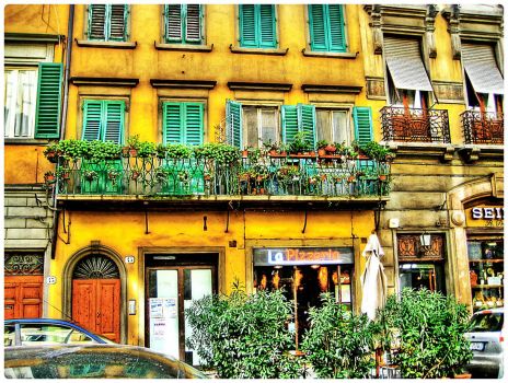 Yellow Building with Green Shutters