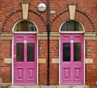 Two pink doors in Leeds, by Tim Green
