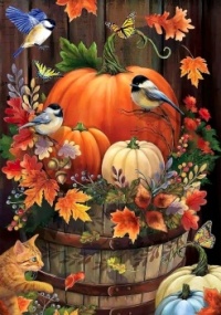 Fall Pumpkins in a Barrel