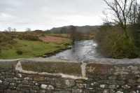 View from Duddon bridge, notice the OS benchmark in the stonework.