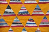 Antique Cheddar String Triangles Quilt Top