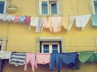 Windows and laundry in Lisbon, by la vie est ailleurs...