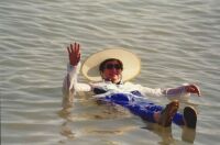 B 128  Kay waving while floating in the Dead Sea at Ein Gedi Spa, Dead Sea, Israel Ap 8, 1994