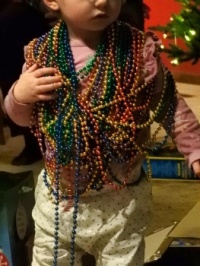 My granddaughter (1 year old) likes jewelry -- but not this much!!