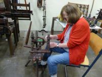Textile museum Winterswijk. My friend trying to spin a thread...