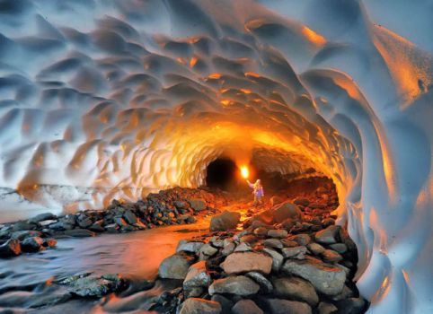 Illumined snow tunnel in Russia