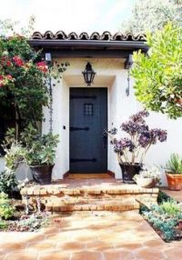 Beautiful Spanish-style home with black door!