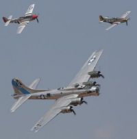 B-17 Being Escorted by P-51 Mustangs
