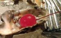 Oysters with a cherry on top