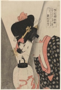 Woman holding a paper lamp by Kitagawa Utamaro