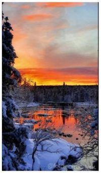 Solnedgång över Laisan i Lappland